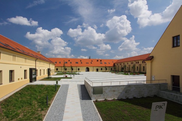 Multifunkční dům za Panským dvorem a zelená plocha